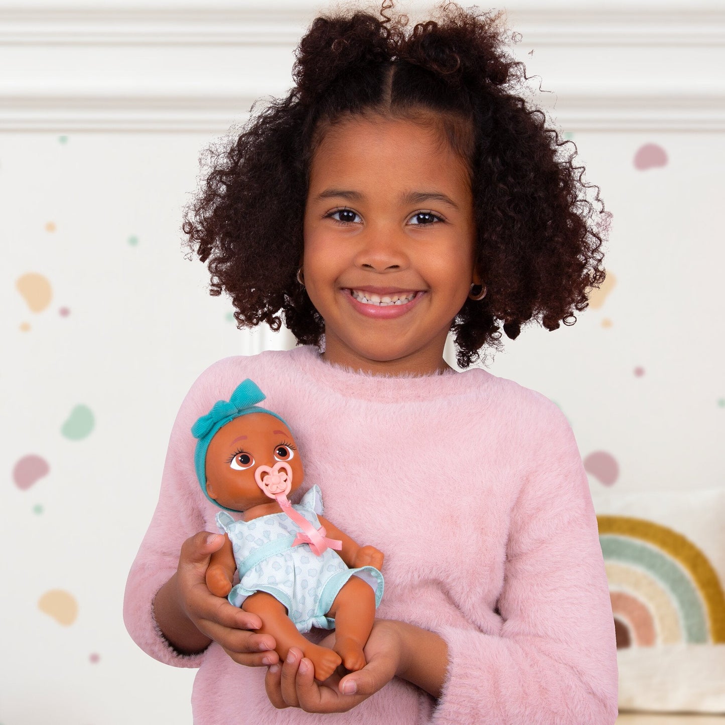 Mini Logan Realistic Doll, Soft Skin, Blue Outfit, 9-Inch Tall, 18M+