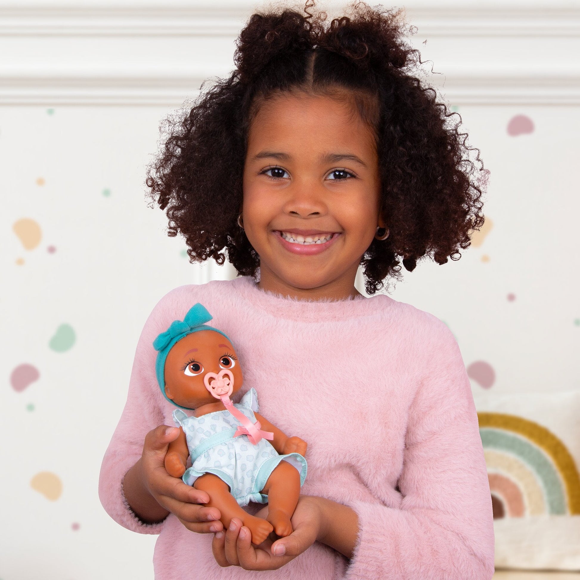 Mini Logan Realistic Doll, Soft Skin, Blue Outfit, 9-Inch Tall, 18M+
